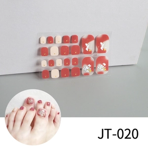 Detail of red and nude 3D toe nail stickers with gold studs and silver foils, model JT-020