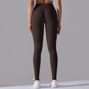 Detail view of seamless yoga leggings with V-shape back stitching for peach butt lifting effect