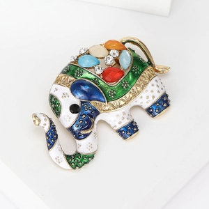 Detailed view of colorful enamel elephant brooch with sparkling rhinestone accents