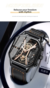 Macro detail of tonneau quartz watch with luminous hands and orange stitched leather strap