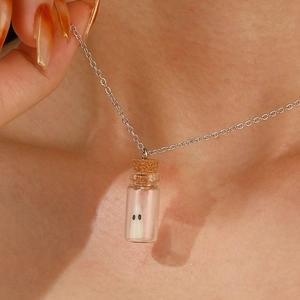 Luminous ghost in a bottle necklace with silver chain and cork stopper for Halloween
