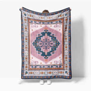 Detailed view of Persian style flannel blanket with geometric ethnic patterns and soft texture