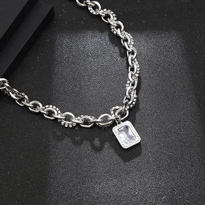 Hip hop silver chain necklace featuring a large rectangular crystal stone pendant