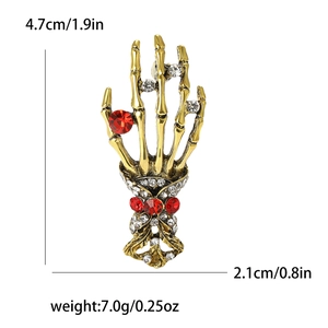 Gothic gold skeleton hand brooch with red crystal and rhinestones sizing 4.7cm x 2.1cm