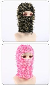 Close-up detail of thick knit plush Balaclava masks in black-gold and pink-white mix