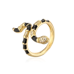 Detailed view of snake ring with black enamel and white zircon stones in 18K gold plating