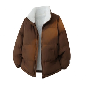 Close-up of warm caramel winter jacket featuring thick white fleece lining and zipper