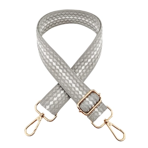 Adjustable grey and white honeycomb woven bag strap with polished gold metal hardware