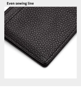 Close-up of black litchi grain leather card holder with precise even sewing line detail