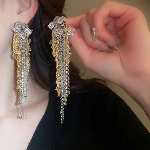 Luxurious gold and silver tassel earrings with sparkling rhinestones for elegant women