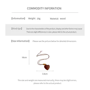 Detailed view of the 3.8cm wooden heart pendant on a 98cm adjustable brown cord necklace