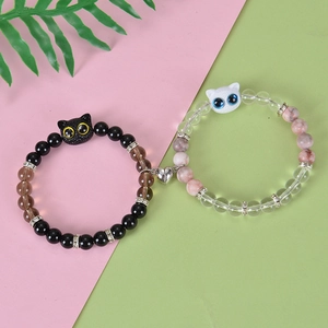 Magnetic cat couple bracelets with black and white beads and heart shaped clasp