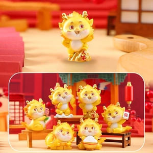 Detailed set of seven yellow Chinese dragon resin figurines with traditional elements