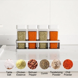 Japanese style kitchen seasoning set with 4 transparent jars and a white storage base