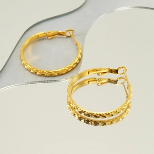 Textured 18k gold plated stainless steel hoop earrings with elegant reflection