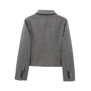Back view of a grey herringbone blazer with double-breasted cut and cuff buttons