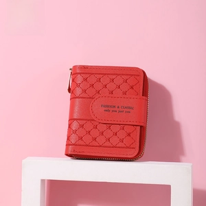 Detail of red small wallet featuring lychee pattern PU leather and diamond embroidery