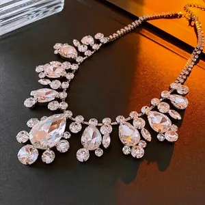 Luxury silver-plated necklace with sparkling teardrop and round crystal pendants for women