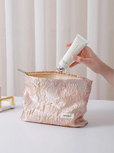 Pink floral jacquard makeup bag with large capacity for travel skincare storage
