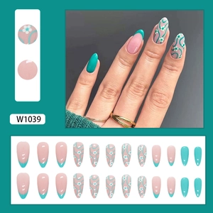 French almond press-on nails with green vine floral patterns and nude pink tones