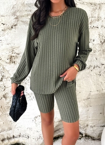 Detail of army green ribbed knit loungewear set featuring long sleeve top and high waist shorts