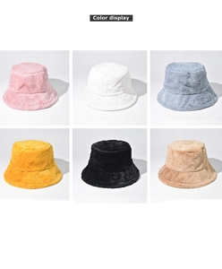 Detail showcasing plush faux fur bucket hats in six colors like pink, blue and beige