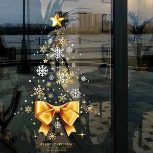 Golden Christmas tree window decals with snowflakes and Merry Christmas message