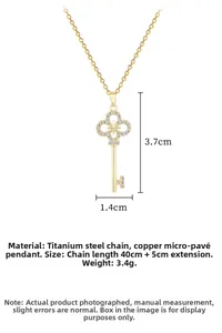 Detailed view of golden starburst cross key pendant with precise dimensions and zircon inlay