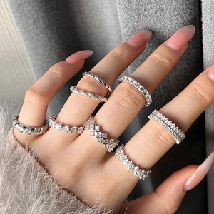 Elegant S925 sterling silver ring set with heart and geometric zircon stones on model hand