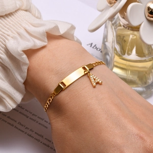 Minimalist gold stainless steel bracelet with letter A pendant and rectangle nameplate