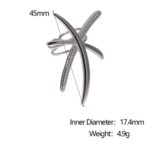 Detail view of silver crossover dragonfly ring with dimensions 45mm and inner diameter 17.4mm