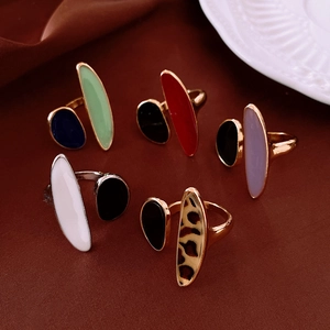 Set of five adjustable leopard print open rings with colorful enamel oval accents