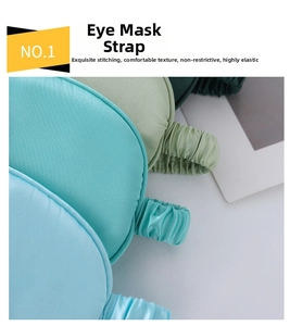 Close-up of silk sleep mask elastic straps in various shades of green and blue