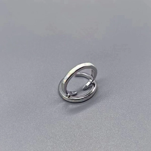 Detail of S925 sterling silver toe ring with double band and white opal inlay setting