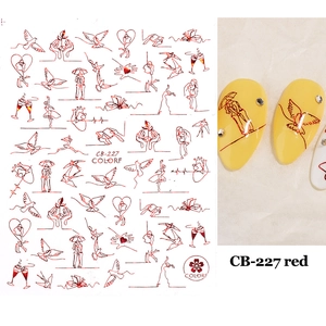 Detail view of 3D line art nail stickers with heart and rose patterns on a white base