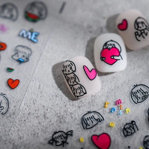 3D embossed cartoon nail art stickers with heart and musical motifs on white nails