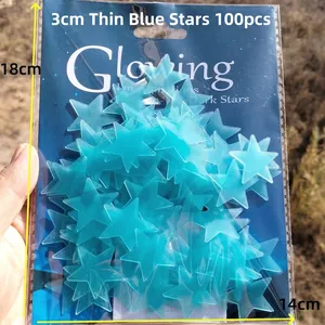 Close-up of 100pcs 3cm blue glowing star wall stickers in card blister packaging