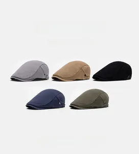 Close-up of vintage British ivy caps in five colors with metal side adjustment buckles