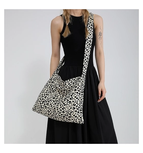 Macro shot of minimalist tote bag featuring bold black and white leopard print fabric