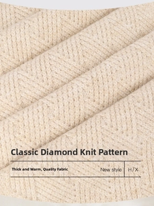 Detailed macro view of classic diamond-pattern knit fabric in beige thick thermal wool