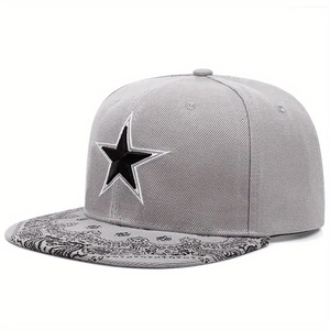 Detail of grey snapback hat with paisley pattern brim and embroidered star logo