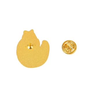 Golden cat-shaped metal pin back with textured matte finish and standard butterfly clasp