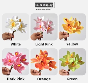 Close-up of 3D printed cymbidium orchids in six colors including white pink and yellow