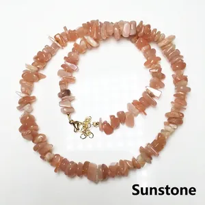 Detail of sunstone chip necklace with adjustable gold-plated lobster clasp