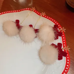 Christmas bow and pom-pom earrings set with gold snowflakes and red velvet tassels
