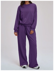 Detail of purple sports hoodie set with dropped shoulder top and drawstring wide-leg pants