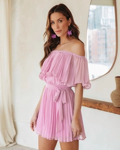 Detailed view of pink off-the-shoulder pleated jumpsuit with elegant waist tie detail