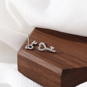 Elegant S925 sterling silver heart-shaped key stud earrings with sparkling pavé crystals