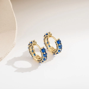 Vintage gold hoop earrings with deep blue zircons and black stone accents for men and women