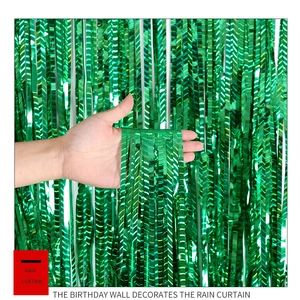 Close-up of vibrant green metallic foil fringe curtain for party wall decoration
